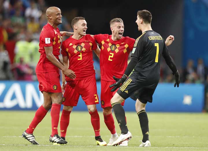 Belgium's players celebrate their second goal as they outplayed Brazil in the first half during the quarterfinal match between Brazil and Belgium at the 2018 soccer World Cup at the Kazan Arena in Kazan, Russia on Friday.