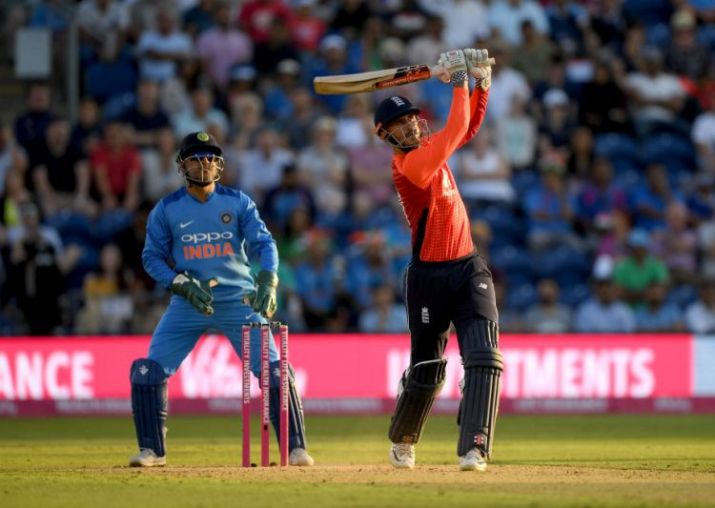 Alex Hales smashes a six and a four in the final over bowled by Bhuvneshwar Kumar to lead England to a thrilling series-tying 5-wicket victory against India in the second Twenty20 on Friday.
