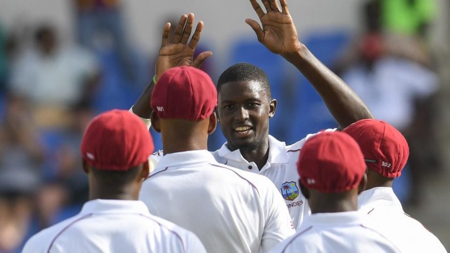 West Indies celebrate a wicket on day 2 of the 1st Test between West Indies and Bangladesh at Sir Vivian Richards Cricket Ground, North Sound, Antigua on Saturday.