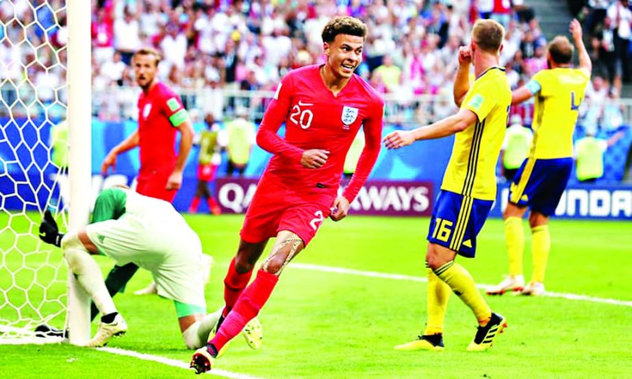 Dele Alli of England celebrates after scoring his team's second goal.