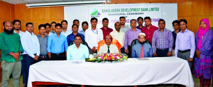 Manjur Ahmed, Managing Director of Bangladesh Development Bank Limited, poses with the participants of five-daylong training course on "Foreign Exchange and International Trade Finance" at the bank's Training Institute in the city on Sunday. Mohammad N