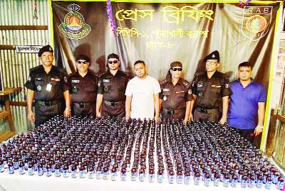 PATUAKHALIU: Members of RAB-8 arrested a drug trader with seven hundred bottles of phensidyl on Sunday.