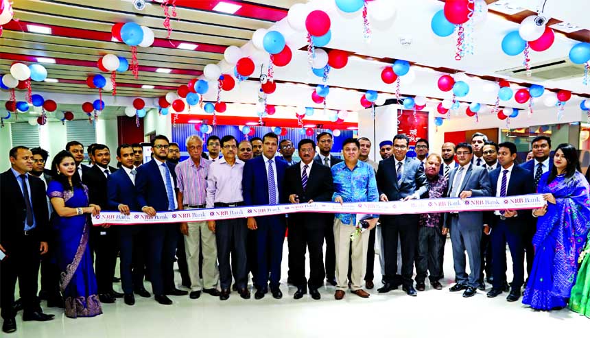 Md. Mehmood Husain, Managing Director of NRB Bank Limited, inaugurating the bank's GEC Crossing Branch at the new location O. R. Nizam Road Branch on Sunday. Imran Ahmed, FCA, Chief Operating Officer and Rahat Shams, head of retail banking are, among oth