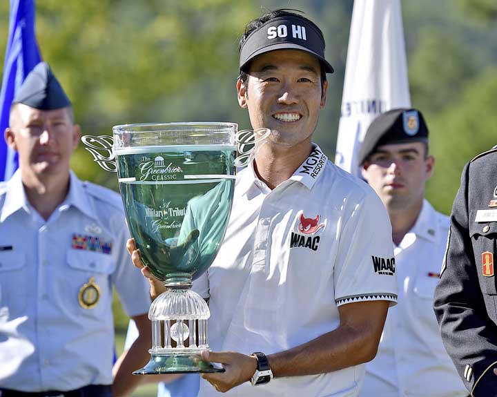 Kevin Na poses with the trophy after winning the Military Tribute PGA Tour Golf Tournament at the Greenbrier on Sunday in White Sulphur Springs, W. Va.