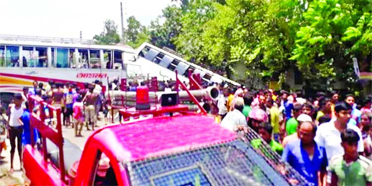 At least two people, including driver were killed and 30 others injured in a tragic road accident in Kalitala of Gobindaganj Upazila under Gaibandha district on Monday.