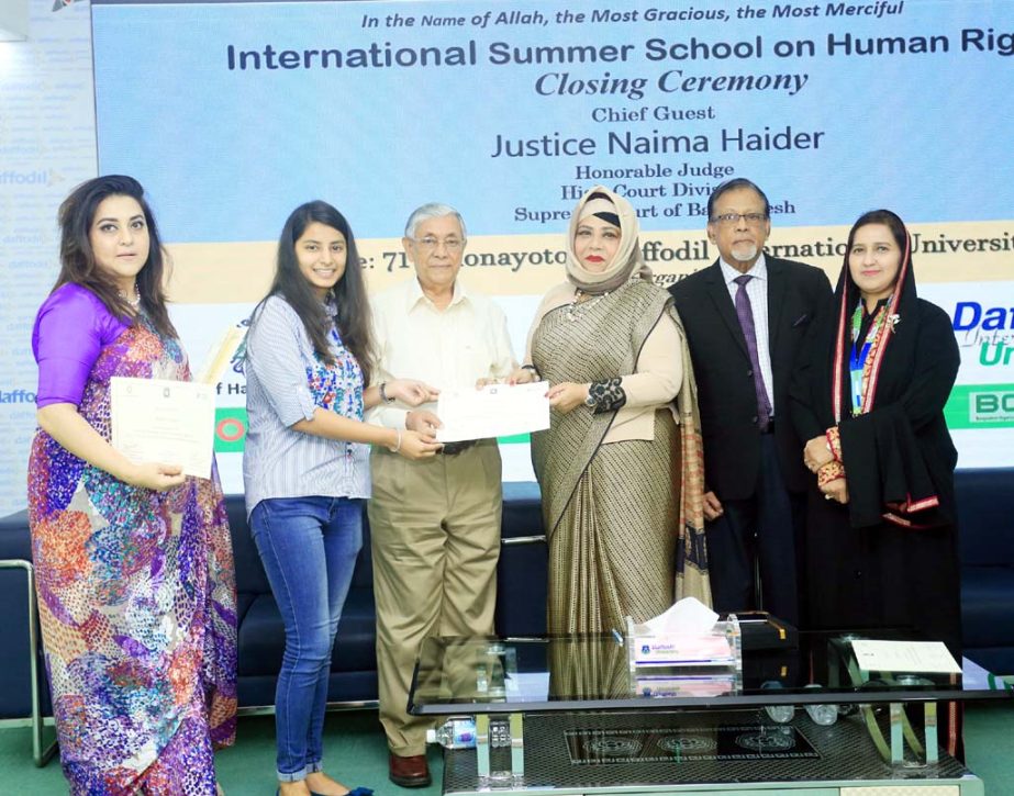 Justice Naima Haider distributing certificates among the participants of a 5-Day long 'International Summer School of Human Rights' jointly organized by Institute of Hazrat Mohammad (SAW), Knowledge Steez, India and Daffodil International University rec