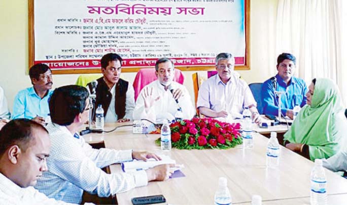 Chairman of the Parliamentary Standing Committee on Ministry of Railway ABM Fazle Karim Chowdhury MP(4th from right) addressing a view exchange meeting at Raozan Upazila Conference Hall on Monday . Chief Engineer of LGED Md. Abul Kalam was also pre