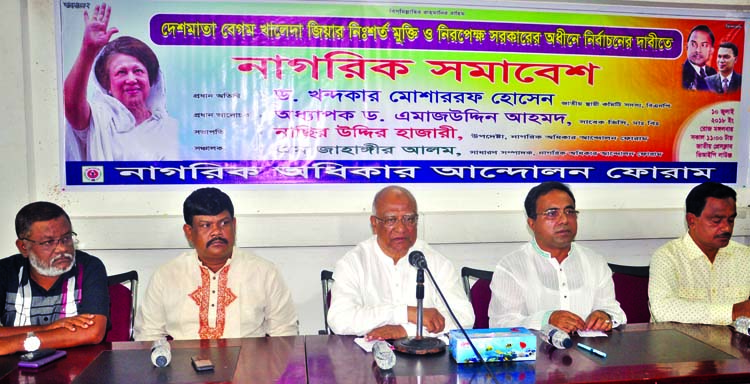 BNP Standing Committee Member Dr Khondkar Mosharraf Hossain speaking at a citizens' rally organised by 'Nagorik Adhikar Andolon Forum'at the Jatiya Press Club on Tuesday demanding unconditional release of BNP Chairperson Begum Khaleda Zia and election