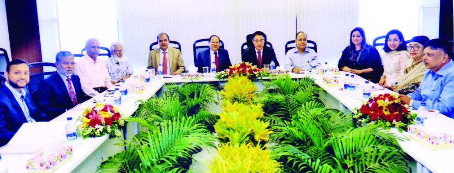 Abdullah Al-Mahmud (Mahin), Chairman of Crystal Insurance Company Limited, presiding over the 79th meeting of the Board of Directors of the company recently. AHM Mozammel Hoque, Md. Tajul Islam, Asoke Ranjan Kapuria, Shahzadi Begum, Farhana Danesh and Soe