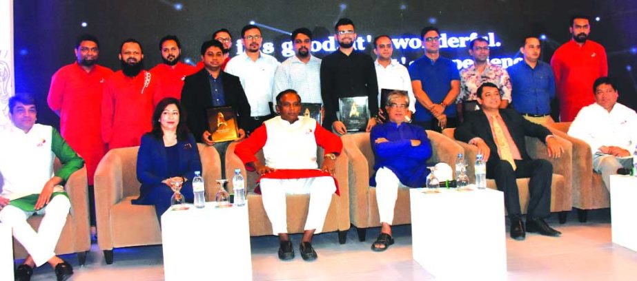 Posts, Telecommunications and IT Affairs Minister Mustafa Jabbar, poses for a photograph at the r-venture launching ceremony at a hotel in the city on Sunday as chief guest. Seven Robi employees started their journey for becoming an entrepreneur under the