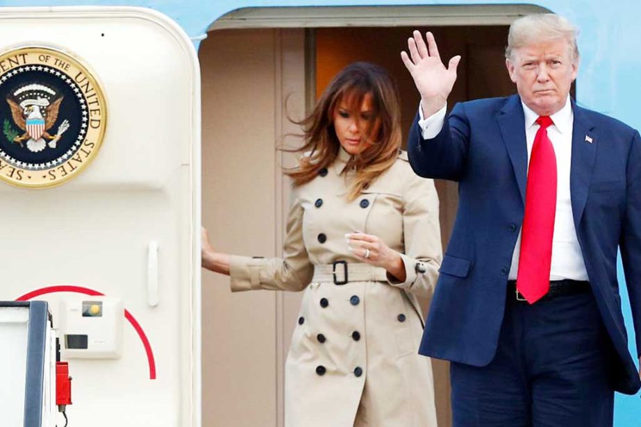 US President Donald Trump and first lady Melania Trump arrive aboard Air Force One ahead of the NATO Summit, at Brussels Military Airport in Melsbroek, Belgium on Tuesday.