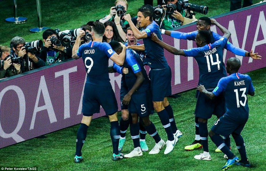 France's players celebrate scoring the winning goal of the World Cup's first semi-final this year against Belgium.