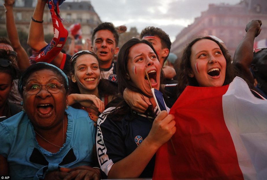 Supporters wildly celebrate after France beating Belgium 1-0 to reach a third World Cup final in the last six tournaments.