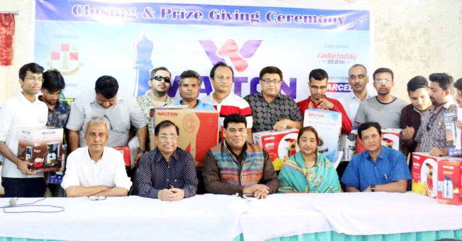 The winners of the Walton Metropolis FIDE Rating Chess Tournament with the chief guest Senior Operative Director (Head of Games & Sports) FM Iqbal Bin Anwar Dawn and the officials of Bangladesh Chess Federation pose for a photo session at Bangladesh Chess