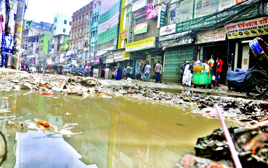 Digging free-style: This is Nawabpur Road; an ancient and most vital road in Old Dhaka City, which is associated with several important business hubs, including Shankhari Potti and Gulistan area. Especially, the country's largest hardware and electric go