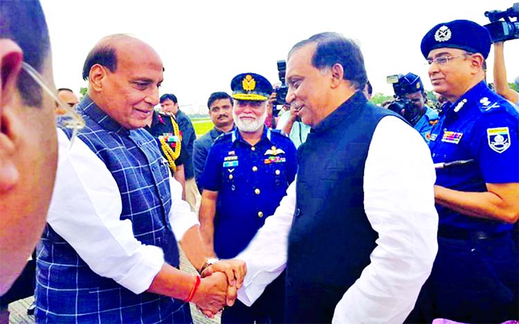 Home Minister Asaduzzaman Khan Kamal receiving Indian Home Minister Rajnath Singh at Bangabandhu Air Base in Dhaka as he arrived here on a three-day visit. Indian High Commissioner Harsh Vardhan Shringla among other civilian and military officials were pr