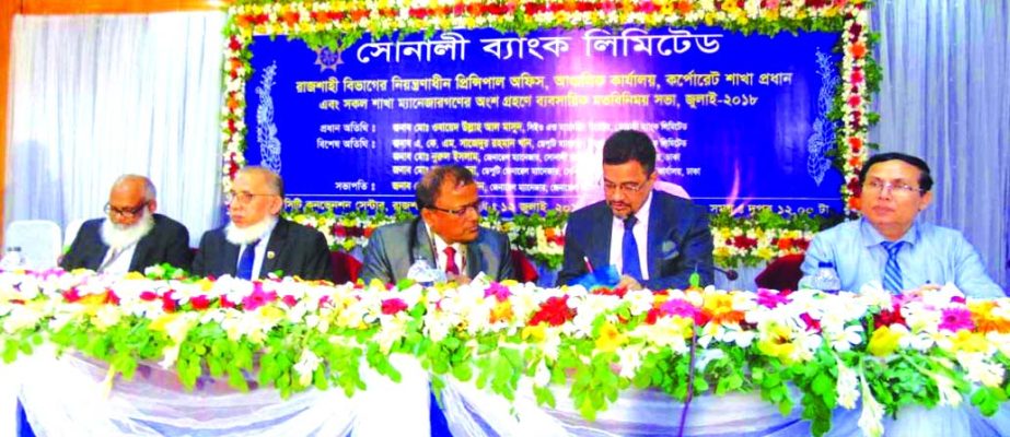 Md Obayed Ullah Al Masud, Managing Director of Sonali Bank Limited, presiding over its daylong 'Business Review Meeting-2018' of Rajshahi division at a local convention center on Thursday. AkM Sajedur Rahman Khan, DMD and Md Nurul Islam, General Manager