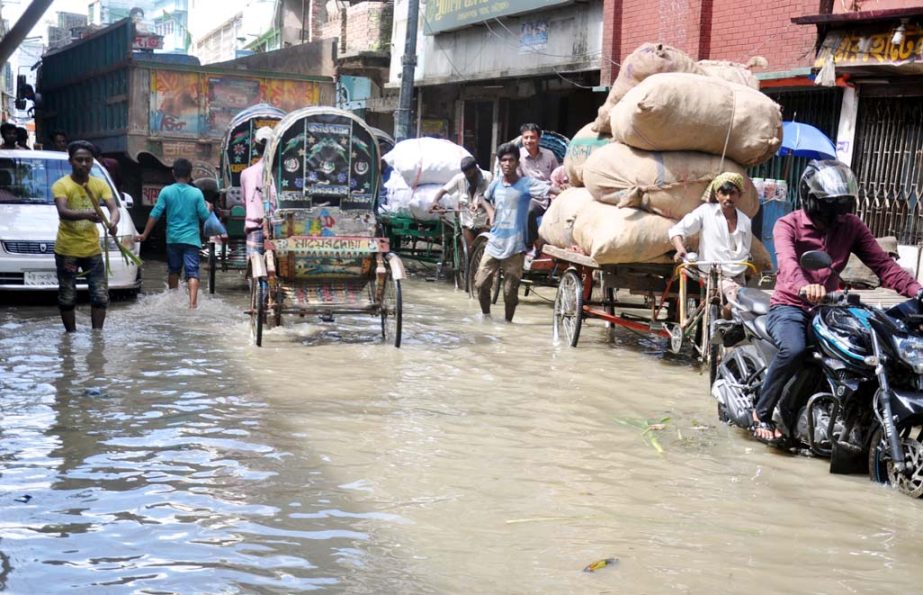 Different business houses facing problem at Khatunganj as most of the roads in the Port City are water- logged. This snap was taken yesterday.