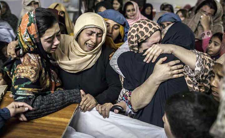 Women mourn their relative who was killed in bomb blast in Pakistan Northwest town of Bannu on Friday.