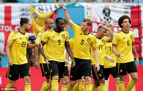 Belgium players celebrate after Thomas Meunier's goal gave them an early lead in the third-place playoff against England.