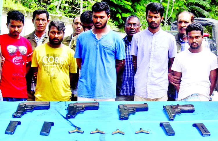 DB police arrested five accused persons from city's Gulshan and Mirpur areas on Friday night in connection of killing of Badda Awami League leader Farhad Hossain and recovered four pistols. This picture was taken from DMP Media Centre on Saturday.