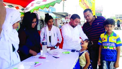 TRISHAL (Mymensingh): A B M Anisuzzaman , Mayor, Trishal Pourashava administering Vitamin 'A' Plus on Saturday.