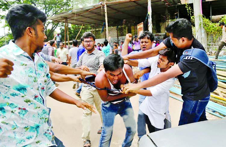 Quota reform activists were mercilessly beaten up allegedly by BCL men in front of the newly constructed Sheikh Russel Tower in the city on Sunday.