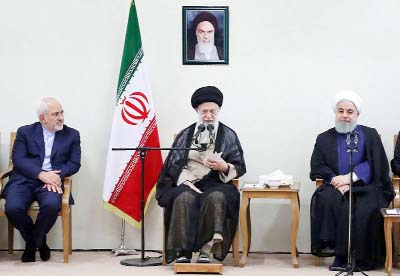 Iran's supreme leader Ayatollah Ali Khamenei Â© sits between President Hassan Rouhani Â® and Foreign Minister Mohammad Javad Zarif (L) during a meeting in Tehran.