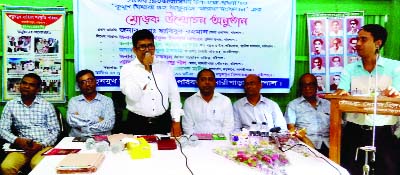 BANARIPARA(Barishal): Md Habibur Rahman, DC, Barishal speaking at the cover unveiling programme of 'Kumud Bihari Guha Thakurda Sarok Sangkolon' on the occasion of the 25th founding anniversary of Nutun Mukh Sahitya Sanskritik Parishad as Chief Guest