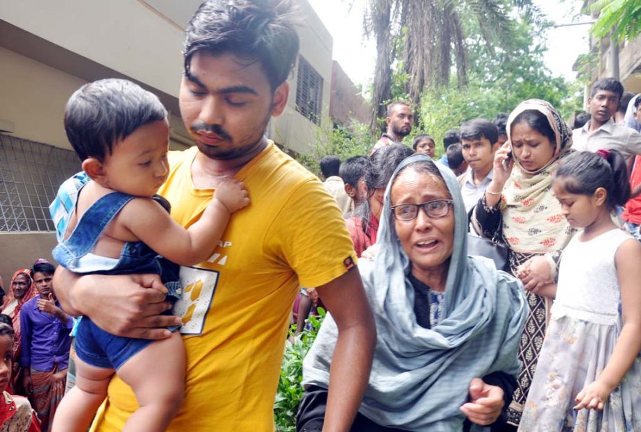 Relatives of mother and daughter murder at Khulshi area wailing after hearing the news on Sunday.