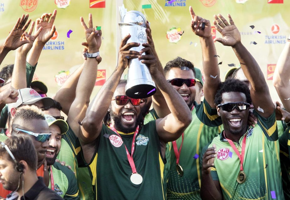 Vancouver Knights' Chris Gayle holds up the trophy after his team defeated the West Indies B Team in their final of the Global T20 Canada cricket tournament in King City, Ontario, on Sunday.