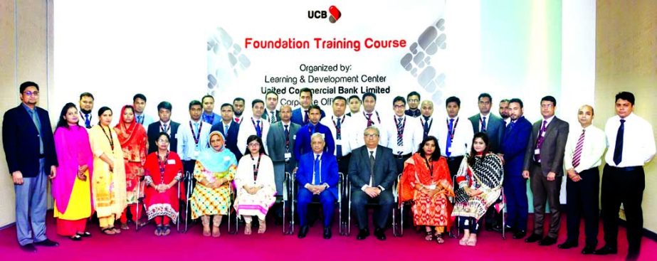 Arif Quadri, Additional Managing Director and Head of Human Resources Management Division of United Commercial Bank Limited, poses with the participants of a month-long Foundation Training Programme for executives of the Bank recently. Abul Ali Ahad, Seni