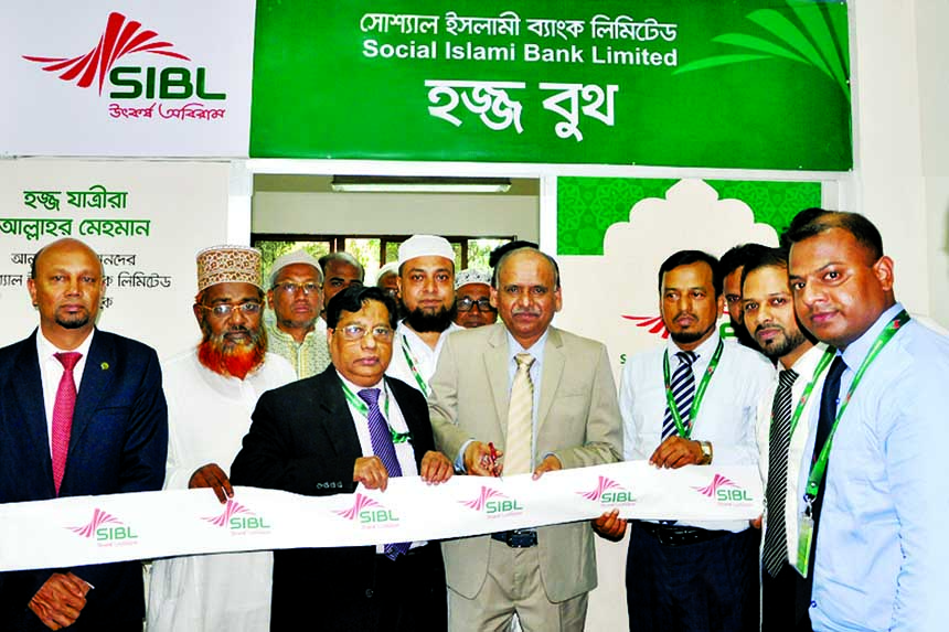 Quazi Osman Ali, Managing Director of Social Islami Bank Limited, inaugurating a Hajj Booth as the chief guest at the Hajj Camp at Ashkuna in the city on Tuesday for rendering services to the Hajj Pilgrims. Ihsanul Aziz, Additional Managing Director, Md