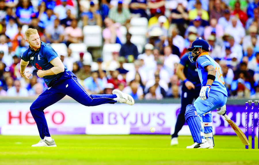 England's Ben Stokes (left) and India's Virat Kohli in action during the third One Day International cricket match between England and India at Emerald Headingley in Leeds, England on Tuesday.