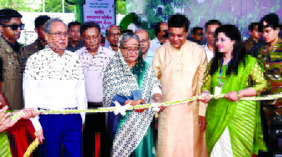 Prime Minister Sheikh Hasina inaugurating World Environment Day & Environment Fair and National Tree Plantation Drive-2018 by cutting ribbon at Bangabandhu International Conference Center in the city on Wednesday. BSS photo