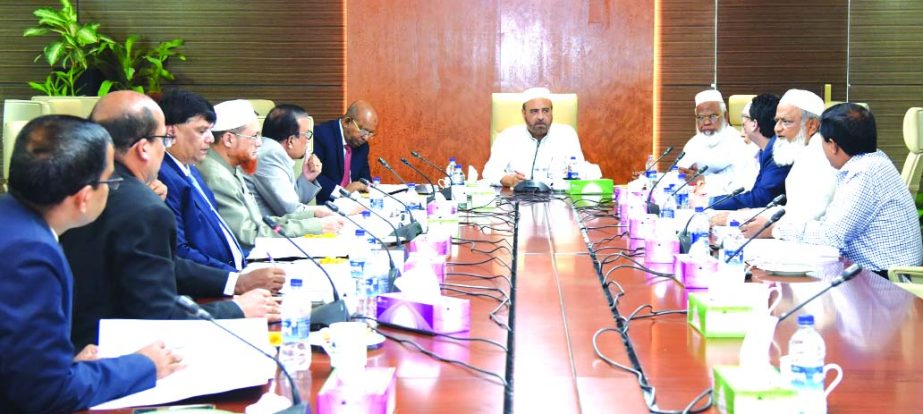 Md Enayet Ullah, Chairman of the Executive Committee of the Board of Directors of Al-Arafah Islami Bank Limited, presiding over its 613th EC meeting at its head office on Thursday. Members of the Committee Nazmul Ahsan Khaled, Md. Harun-Ar-Rashid Khan, E