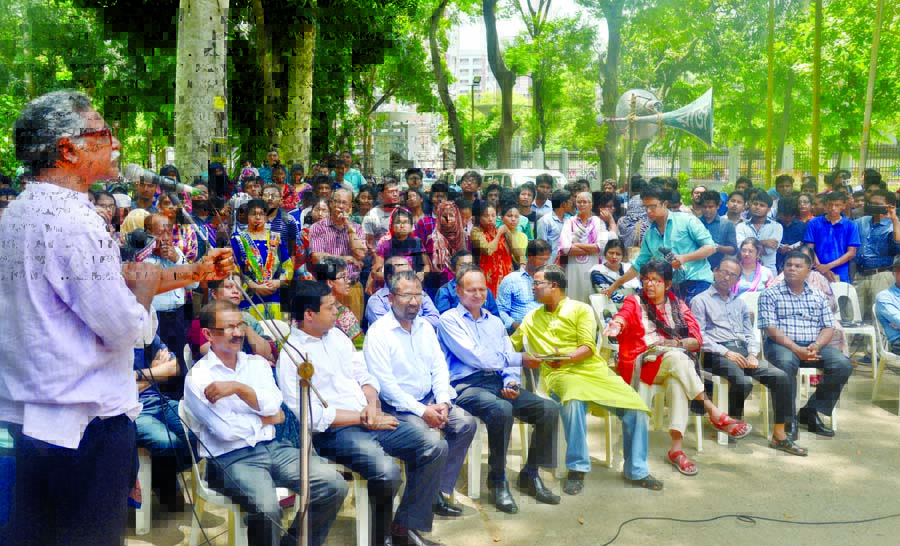 A section of DU teachers and students on Thursday held a protest rally against recent attacks on quota reformists by some BCL men at different universities. Photo shows Prof Anu Mohammad speaking at the rally near Aporajeo Bangla.