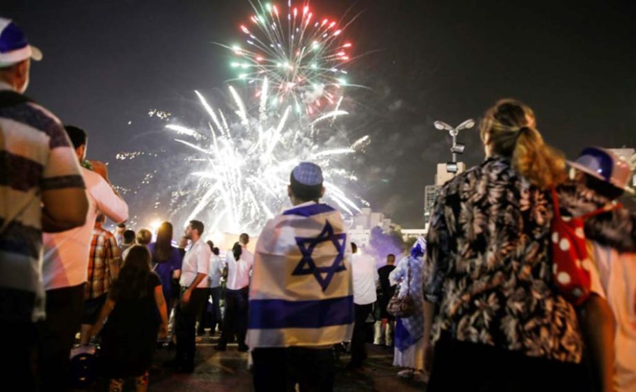 Israelis watch fireworks over Jerusalem on April 18, 2018, at the start of the country's 70th Independence Day celebrations.