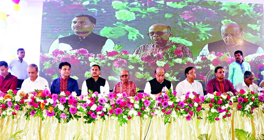 Health and Family Welfare Minister Mohammad Nasim along with other distinguished persons at the annual general meeting of 'Mahanagar Sarbajanin Puja Committee' at Shri Shri Dhakeshwari National Temple on Friday.