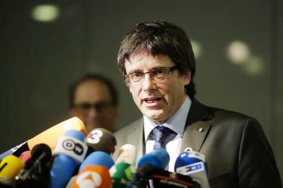 Former Catalan leader, Carles Puigdemont, addresses the media during a news conference in Berlin, Germany.