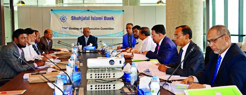 Anwer Hossain Khan, Chairman of the Executive Committee (EC) of Shahjalal Islami Bank Limited, presiding over its 750th meeting of the EC held recently at the Banks's head office. Among others, the Vice-Chairman of the EC Fakir Akhtaruzzaman, the Directo