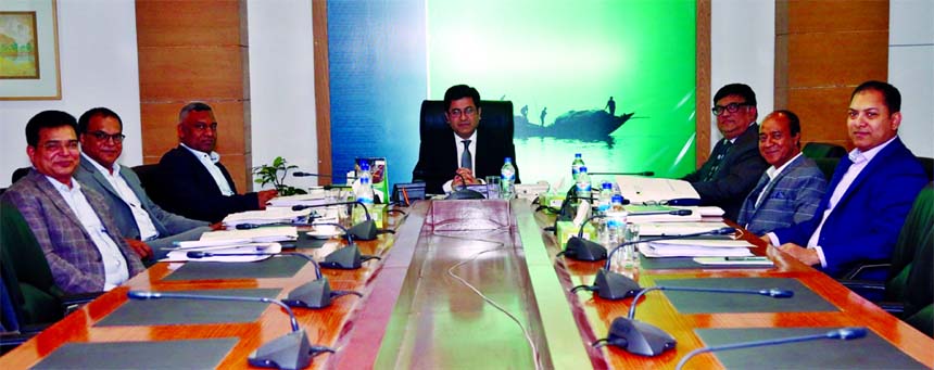 Barrister Sheikh Fazle Noor Taposh, MP, Chairman of Executive Committee of Modhumoti Bank Limited, presiding over its 74th EC meeting recently. Md. Shafiul Azam, Managing Director of the Bank, Mohammad Ismail Hossain, Managing Director of Sharmin Group, S