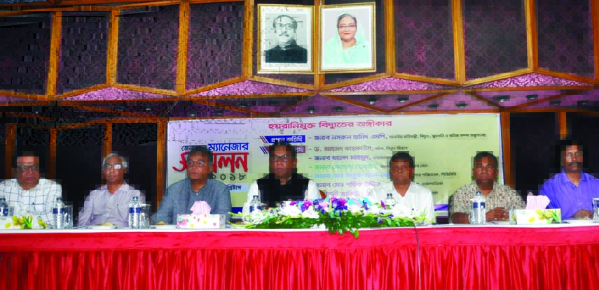 State Minister for Power, Energy and Mineral Resources Nasrul Hamid, among others, at the concluding day of General Managers' Conference of Bangladesh Rural Electrification Board at its Training Academy building in the city on Saturday.