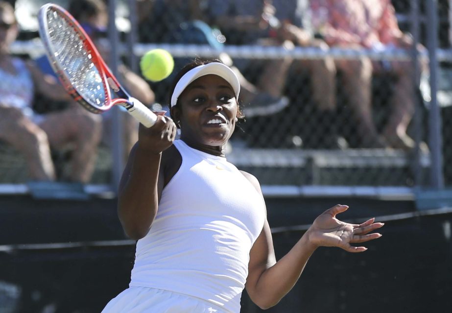 Sloane Stephens of the United States, returns to opponent Madison Keys, also of the United States during an exhibition match at the International Hall of Fame's center court on Friday.