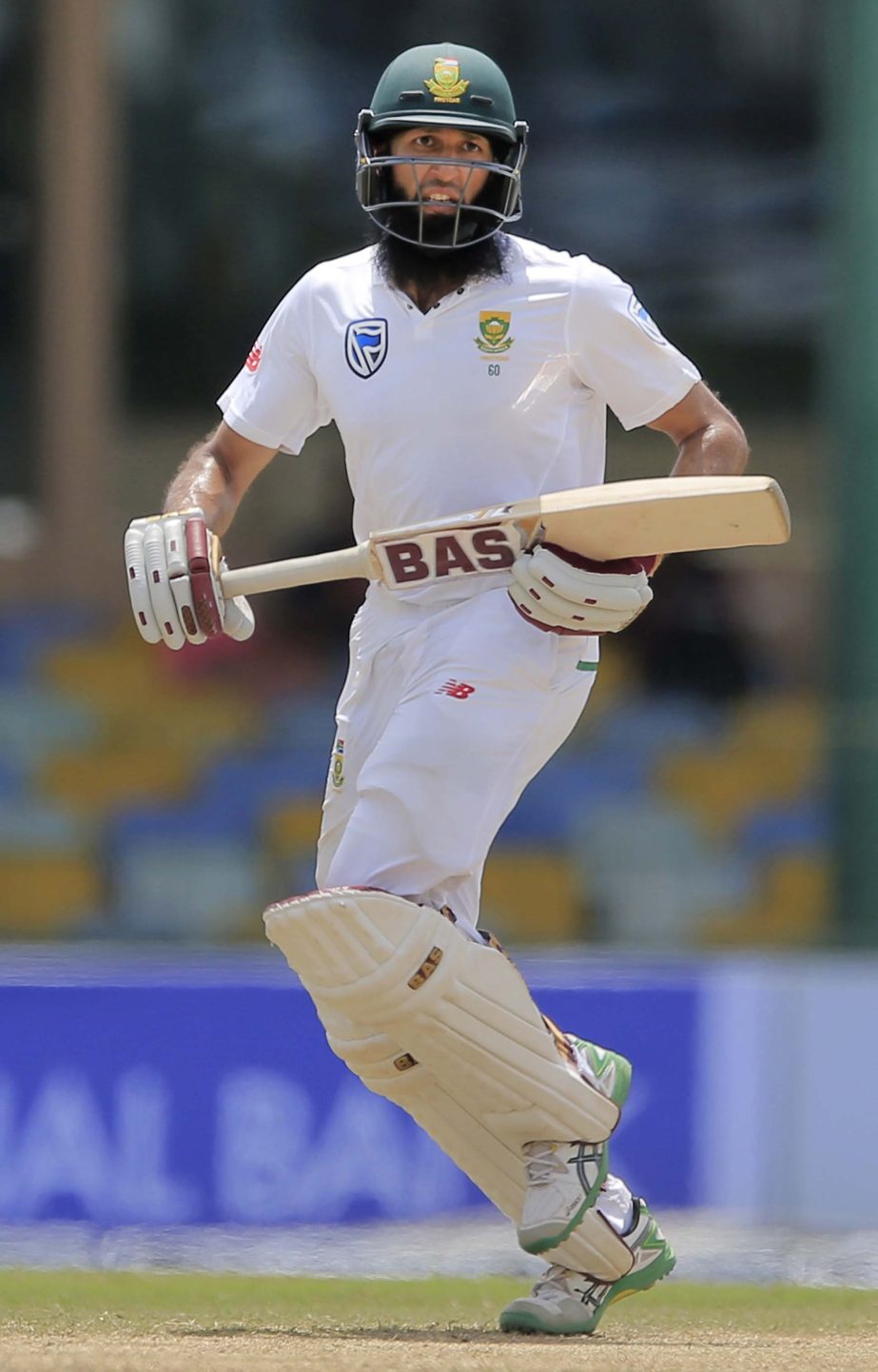 South Africa's Hashim Amla runs between the wickets during the second dayâ€™s play of their second Test cricket match against Sri Lanka in Colombo, Sri Lanka on Saturday.