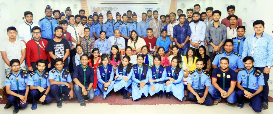 Participants at the '4th Oath Taking Camp 2015' of Daffodil International University at National Scout Training Center, Mouchak, Gazipur along with distinguished guests on Thursday.