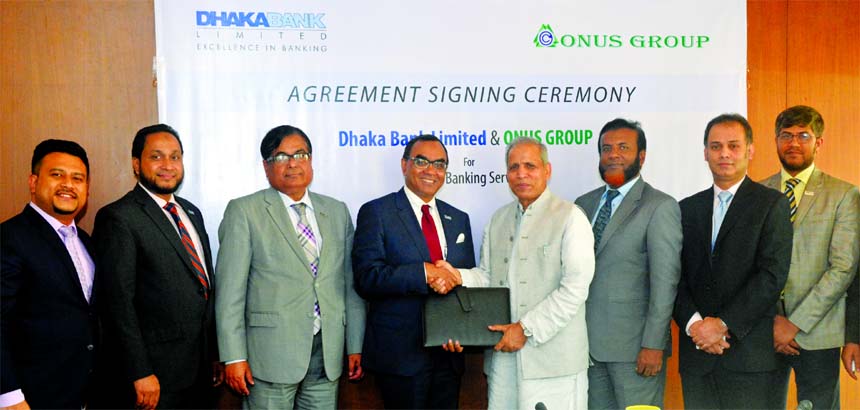 Syed Mahbubur Rahman, Managing Director of Dhaka Bank Limited and Md. Shafiul Islam (Mohiuddin) Managing Director of Onus Group and President of FBCCI are seen exchanging the MoU of Payroll Banking Services at the Bank's Head Office recently. Khan Shaha