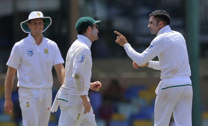 South Africa's Keshav Maharaj (right) celebrates with teammates the dismissal of Sri Lanka's Angelo Mathews during the third dayâ€™s play of their second Test cricket match in Colombo, Sri Lanka on Sunday.