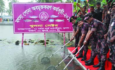 KHULNA: Colonel Md Towhidul Islam, Sector Commander, Khulna Border Guard releasing fish fries in water bodies at Khulna Sector Headquarters on the occasion of the National Fisheries Week on Sunday.