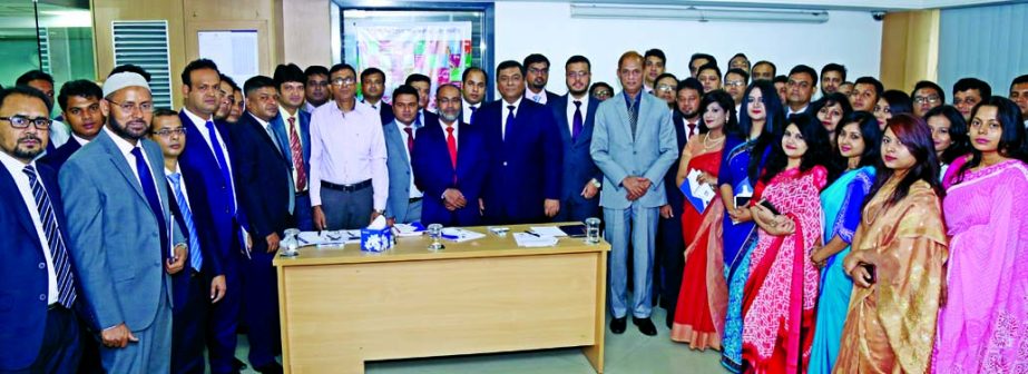 Md. Sazzad Hossain, Director of Bank Asia Securities Limited and DMD of Bank Asia Limited, poses for a photograph with the participants of Half Yearly Business Conference of the securities at its corporate office in the city on Saturday. Sumon Das, CEO an